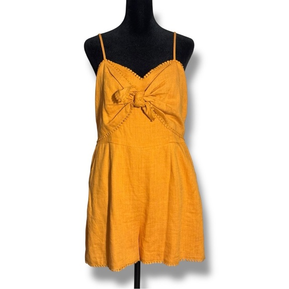 HYGVE Chic Sleeveless Crochet Trim Mustard Adjustable Straps Tie-Front Romper - Picture 1 of 16